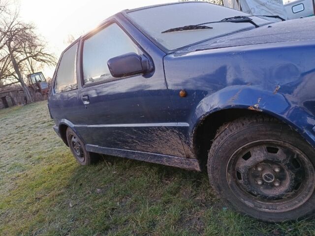 Синій Ніссан Мікра, об'ємом двигуна 1.3 л та пробігом 314 тис. км за 550 $, фото 3 на Automoto.ua
