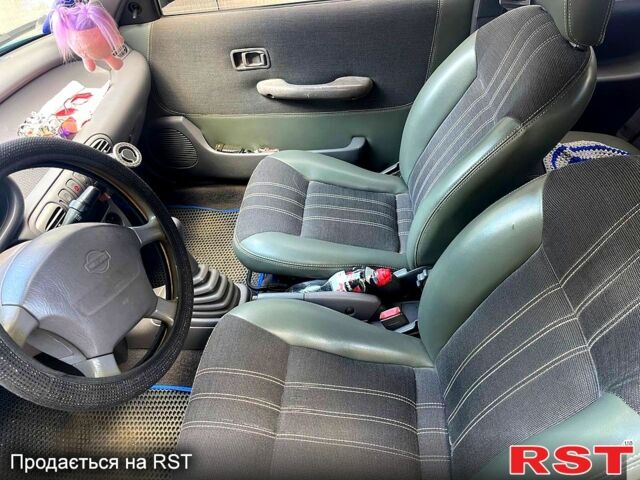 Синий Ниссан Микра, объемом двигателя 1 л и пробегом 285 тыс. км за 2000 $, фото 3 на Automoto.ua