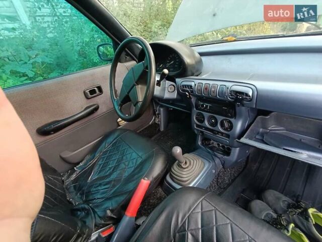 Зеленый Ниссан Микра, объемом двигателя 1 л и пробегом 77 тыс. км за 1500 $, фото 2 на Automoto.ua