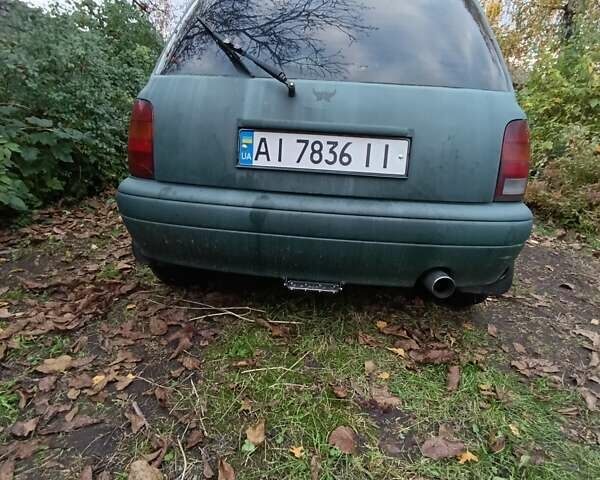 Зеленый Ниссан Микра, объемом двигателя 1 л и пробегом 77 тыс. км за 1500 $, фото 6 на Automoto.ua