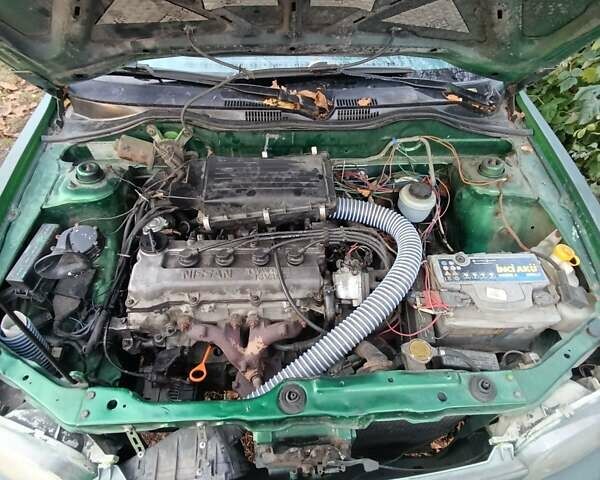 Зеленый Ниссан Микра, объемом двигателя 1 л и пробегом 77 тыс. км за 1500 $, фото 5 на Automoto.ua