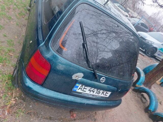 Зелений Ніссан Мікра, об'ємом двигуна 1 л та пробігом 208 тис. км за 1093 $, фото 3 на Automoto.ua