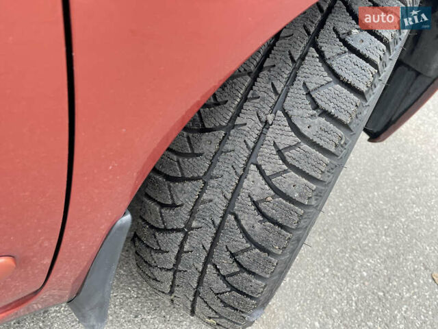 Оранжевый Ниссан Микра, объемом двигателя 1.24 л и пробегом 175 тыс. км за 5300 $, фото 21 на Automoto.ua