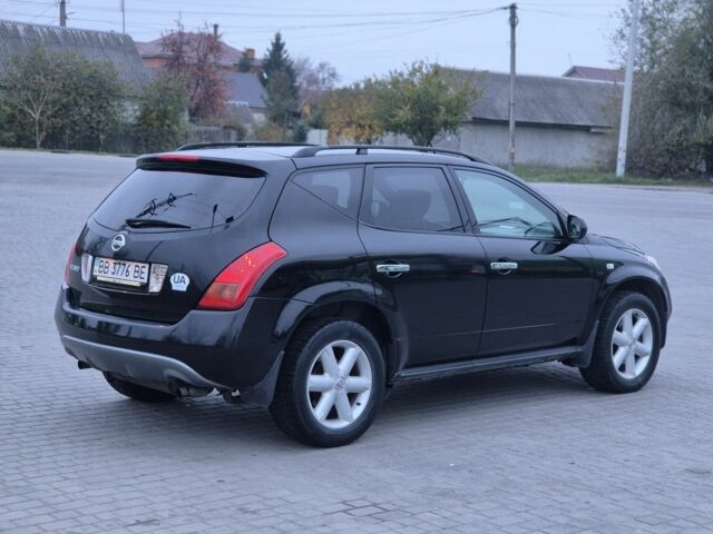 Черный Ниссан Мурано, объемом двигателя 0 л и пробегом 310 тыс. км за 3999 $, фото 3 на Automoto.ua