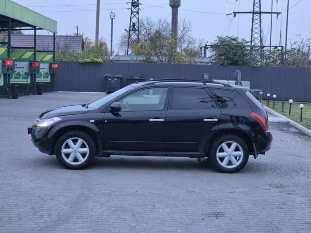 Черный Ниссан Мурано, объемом двигателя 0 л и пробегом 310 тыс. км за 3999 $, фото 2 на Automoto.ua