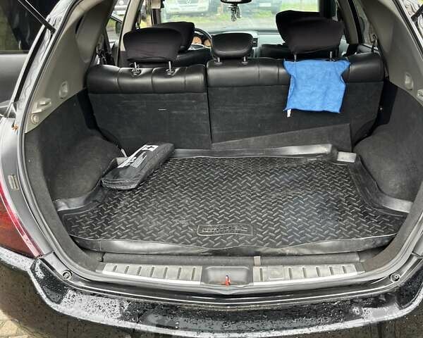 Черный Ниссан Мурано, объемом двигателя 3.5 л и пробегом 208 тыс. км за 4600 $, фото 9 на Automoto.ua