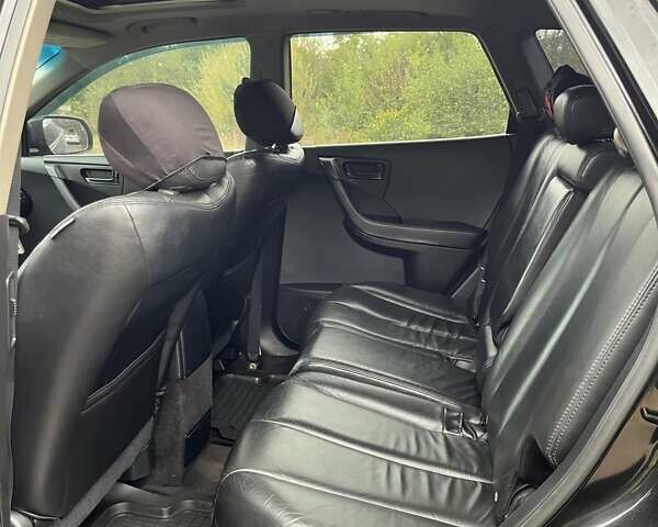 Черный Ниссан Мурано, объемом двигателя 3.5 л и пробегом 208 тыс. км за 4600 $, фото 8 на Automoto.ua