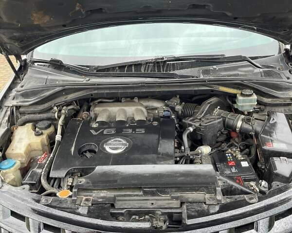 Черный Ниссан Мурано, объемом двигателя 3.5 л и пробегом 208 тыс. км за 4600 $, фото 13 на Automoto.ua