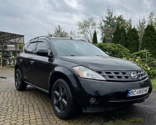 Черный Ниссан Мурано, объемом двигателя 3.5 л и пробегом 208 тыс. км за 4600 $, фото 2 на Automoto.ua