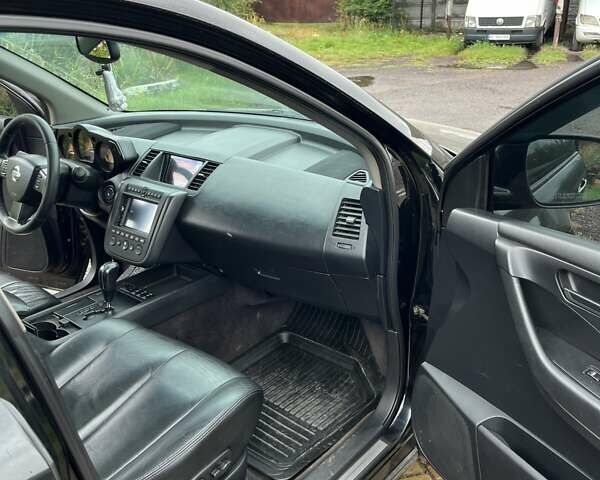 Черный Ниссан Мурано, объемом двигателя 3.5 л и пробегом 208 тыс. км за 4600 $, фото 12 на Automoto.ua