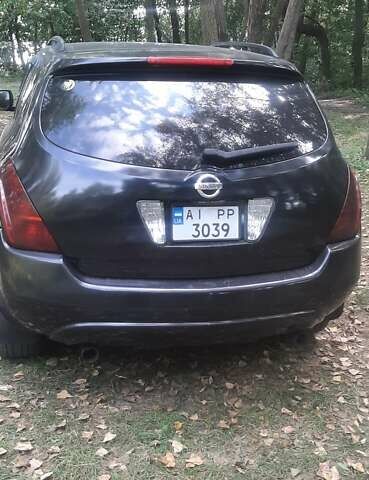 Черный Ниссан Мурано, объемом двигателя 3.5 л и пробегом 250 тыс. км за 5600 $, фото 4 на Automoto.ua