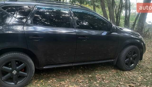 Черный Ниссан Мурано, объемом двигателя 3.5 л и пробегом 250 тыс. км за 5600 $, фото 2 на Automoto.ua