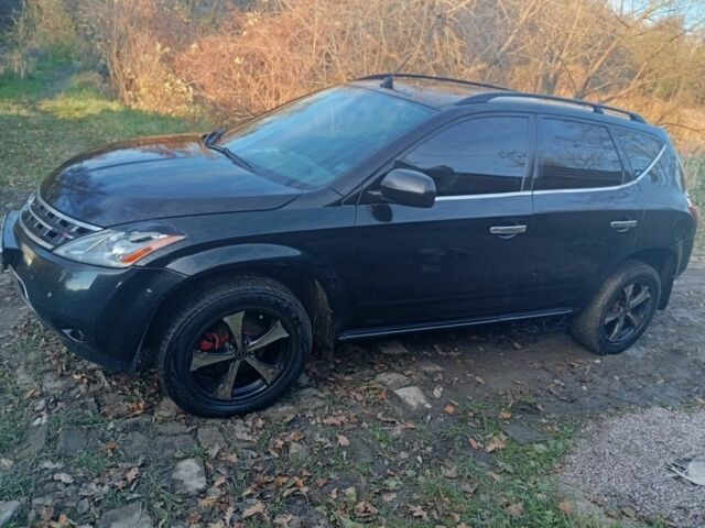 Черный Ниссан Мурано, объемом двигателя 3.5 л и пробегом 301 тыс. км за 4500 $, фото 1 на Automoto.ua