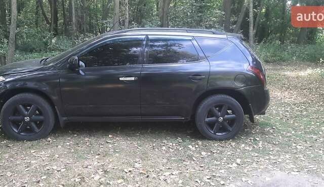 Черный Ниссан Мурано, объемом двигателя 3.5 л и пробегом 250 тыс. км за 5600 $, фото 5 на Automoto.ua