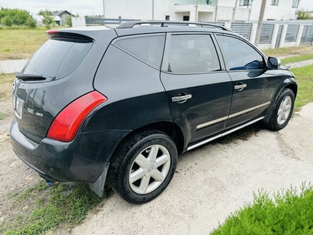 Черный Ниссан Мурано, объемом двигателя 3.5 л и пробегом 236 тыс. км за 4400 $, фото 3 на Automoto.ua