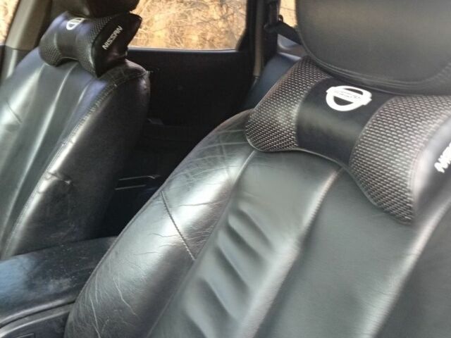 Черный Ниссан Мурано, объемом двигателя 3.5 л и пробегом 301 тыс. км за 4500 $, фото 5 на Automoto.ua