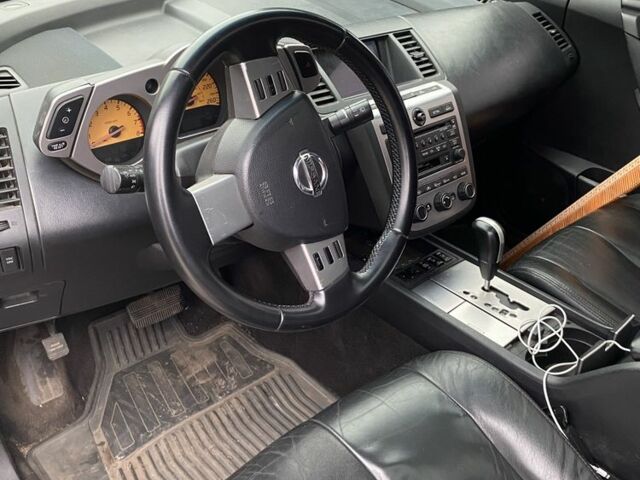 Черный Ниссан Мурано, объемом двигателя 3.5 л и пробегом 291 тыс. км за 6200 $, фото 7 на Automoto.ua