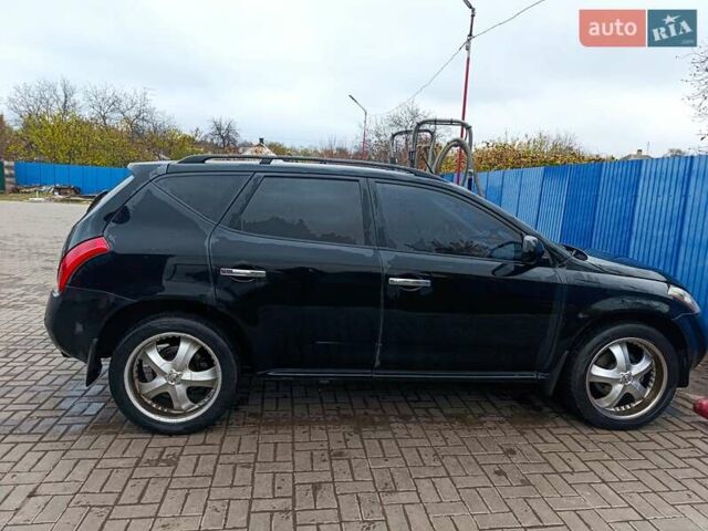 Черный Ниссан Мурано, объемом двигателя 3.5 л и пробегом 348 тыс. км за 4700 $, фото 1 на Automoto.ua