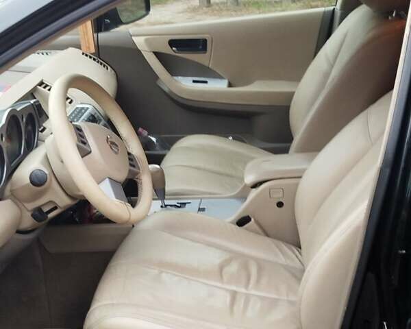 Черный Ниссан Мурано, объемом двигателя 3.5 л и пробегом 225 тыс. км за 7500 $, фото 1 на Automoto.ua