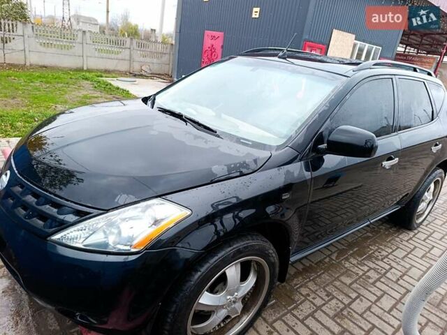 Черный Ниссан Мурано, объемом двигателя 3.5 л и пробегом 348 тыс. км за 4700 $, фото 4 на Automoto.ua