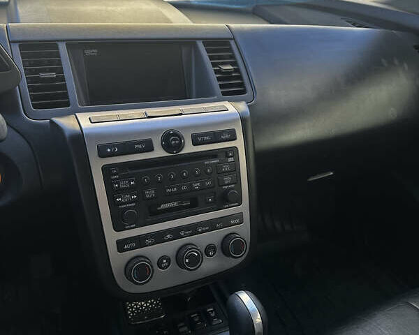 Черный Ниссан Мурано, объемом двигателя 3.5 л и пробегом 230 тыс. км за 7999 $, фото 5 на Automoto.ua