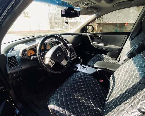 Черный Ниссан Мурано, объемом двигателя 3.5 л и пробегом 173 тыс. км за 6500 $, фото 6 на Automoto.ua