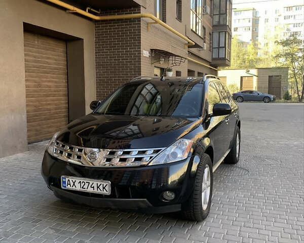 Черный Ниссан Мурано, объемом двигателя 3.5 л и пробегом 230 тыс. км за 7999 $, фото 2 на Automoto.ua