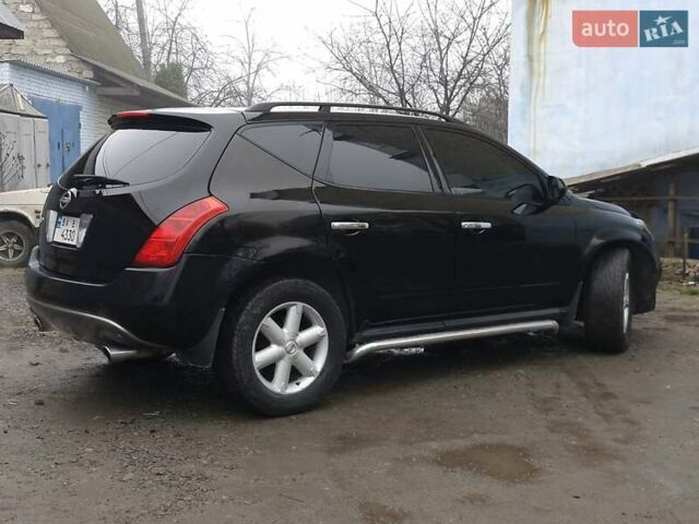 Чорний Ніссан Мурано, об'ємом двигуна 3.5 л та пробігом 189 тис. км за 5999 $, фото 2 на Automoto.ua