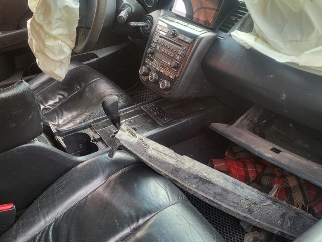 Черный Ниссан Мурано, объемом двигателя 3.5 л и пробегом 270 тыс. км за 2200 $, фото 7 на Automoto.ua