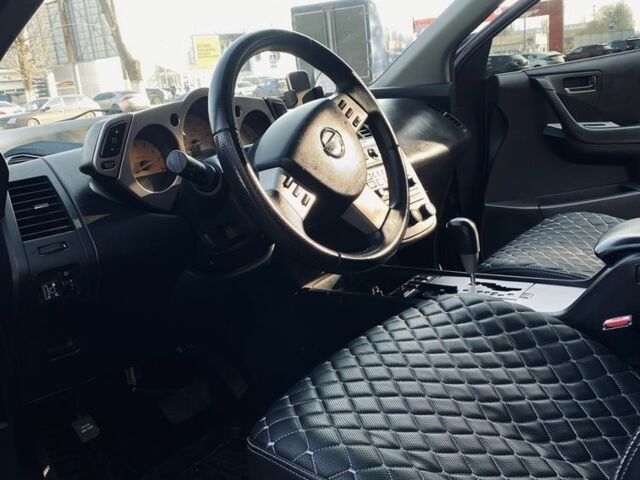 Черный Ниссан Мурано, объемом двигателя 3.5 л и пробегом 175 тыс. км за 6500 $, фото 5 на Automoto.ua