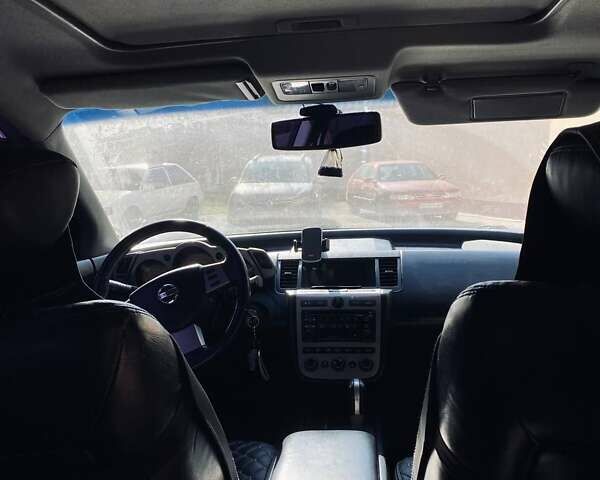 Черный Ниссан Мурано, объемом двигателя 3.5 л и пробегом 173 тыс. км за 6500 $, фото 1 на Automoto.ua