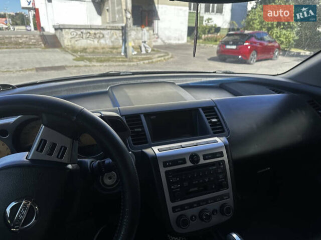 Черный Ниссан Мурано, объемом двигателя 3.5 л и пробегом 230 тыс. км за 7999 $, фото 6 на Automoto.ua