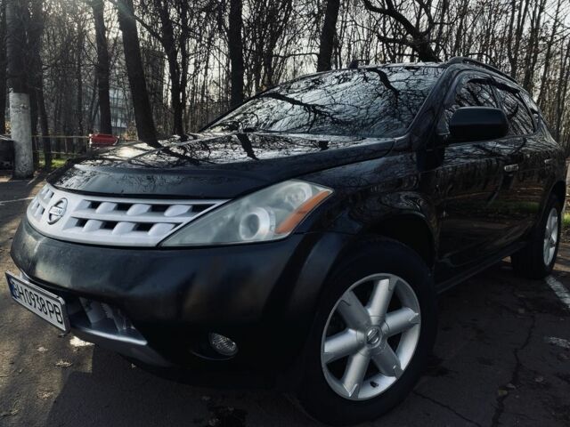 Черный Ниссан Мурано, объемом двигателя 3.5 л и пробегом 175 тыс. км за 6500 $, фото 1 на Automoto.ua