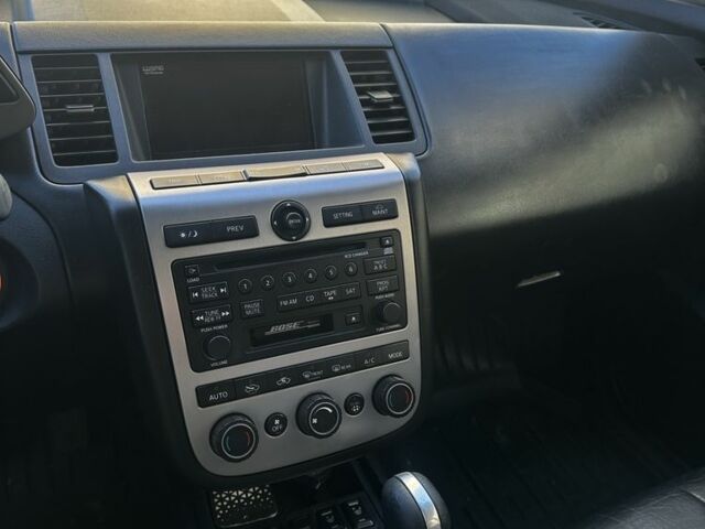 Черный Ниссан Мурано, объемом двигателя 3.5 л и пробегом 230 тыс. км за 7900 $, фото 6 на Automoto.ua