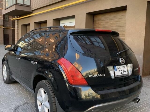 Черный Ниссан Мурано, объемом двигателя 3.5 л и пробегом 230 тыс. км за 7900 $, фото 1 на Automoto.ua