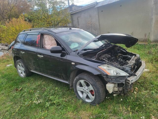 Черный Ниссан Мурано, объемом двигателя 3.5 л и пробегом 270 тыс. км за 2200 $, фото 6 на Automoto.ua