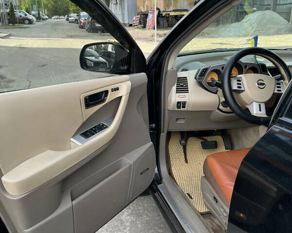 Черный Ниссан Мурано, объемом двигателя 3.5 л и пробегом 188 тыс. км за 4500 $, фото 8 на Automoto.ua