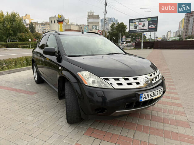 Черный Ниссан Мурано, объемом двигателя 3.5 л и пробегом 317 тыс. км за 4200 $, фото 2 на Automoto.ua