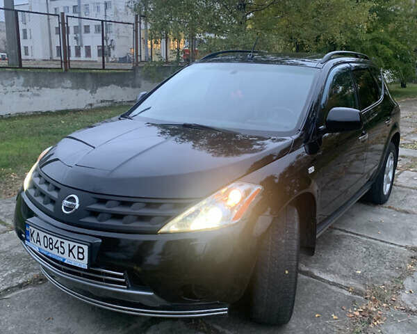 Черный Ниссан Мурано, объемом двигателя 3.5 л и пробегом 282 тыс. км за 7500 $, фото 15 на Automoto.ua