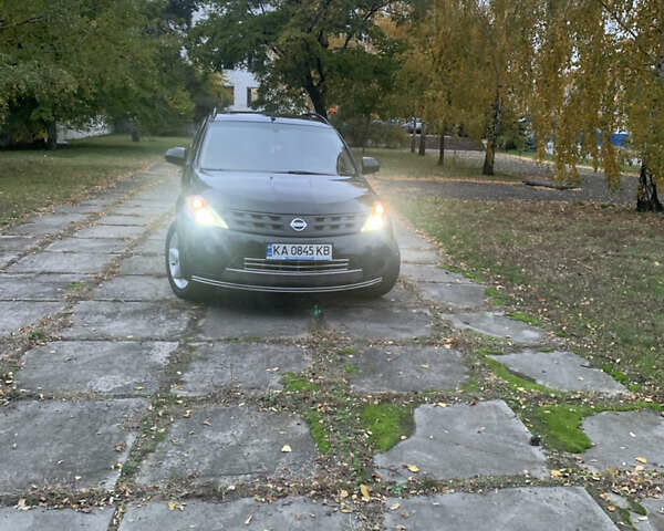 Черный Ниссан Мурано, объемом двигателя 3.5 л и пробегом 282 тыс. км за 7500 $, фото 12 на Automoto.ua