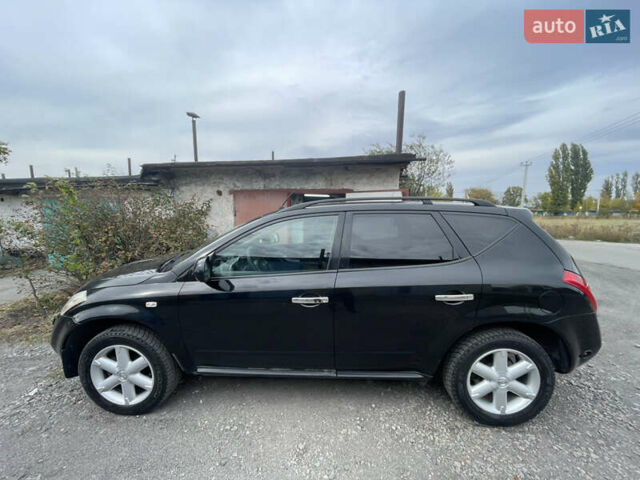 Черный Ниссан Мурано, объемом двигателя 3.5 л и пробегом 290 тыс. км за 6500 $, фото 3 на Automoto.ua