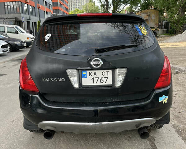 Черный Ниссан Мурано, объемом двигателя 3.5 л и пробегом 188 тыс. км за 4500 $, фото 6 на Automoto.ua