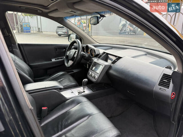 Черный Ниссан Мурано, объемом двигателя 3.5 л и пробегом 317 тыс. км за 4200 $, фото 8 на Automoto.ua