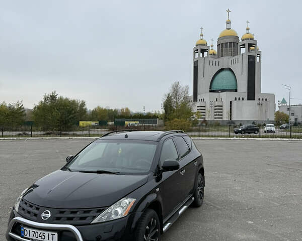 Черный Ниссан Мурано, объемом двигателя 3.5 л и пробегом 230 тыс. км за 6999 $, фото 2 на Automoto.ua