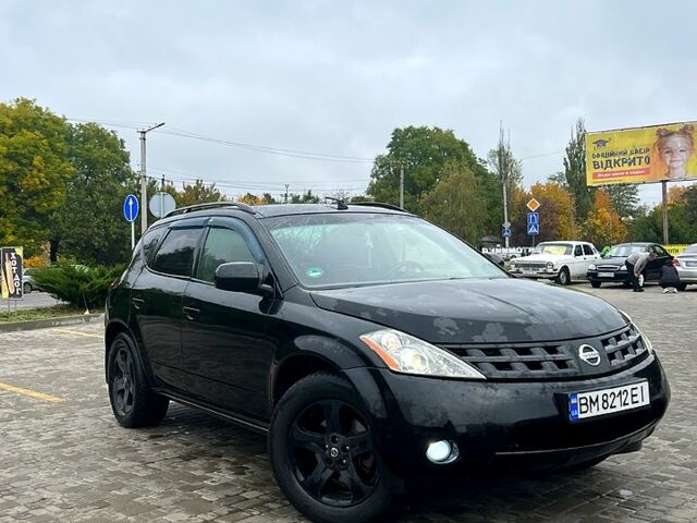 Черный Ниссан Мурано, объемом двигателя 3.5 л и пробегом 250 тыс. км за 5700 $, фото 1 на Automoto.ua