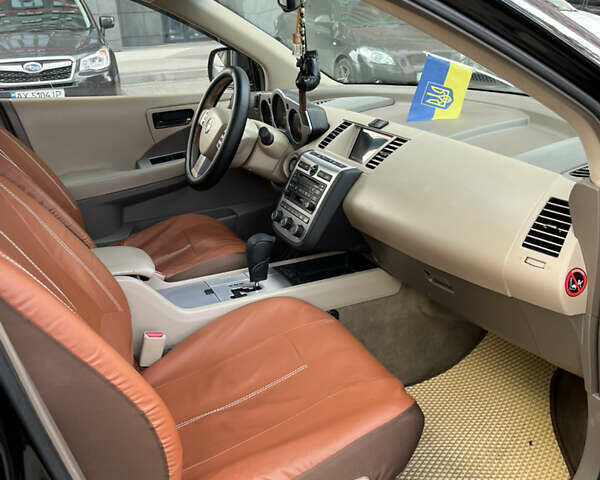 Черный Ниссан Мурано, объемом двигателя 3.5 л и пробегом 188 тыс. км за 4500 $, фото 13 на Automoto.ua