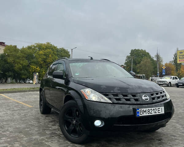 Черный Ниссан Мурано, объемом двигателя 3.5 л и пробегом 250 тыс. км за 6100 $, фото 1 на Automoto.ua