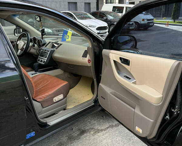 Черный Ниссан Мурано, объемом двигателя 3.5 л и пробегом 188 тыс. км за 4500 $, фото 12 на Automoto.ua