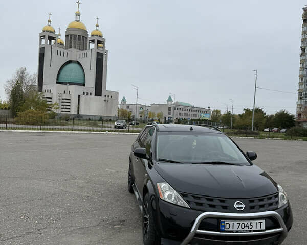 Черный Ниссан Мурано, объемом двигателя 3.5 л и пробегом 230 тыс. км за 6999 $, фото 1 на Automoto.ua