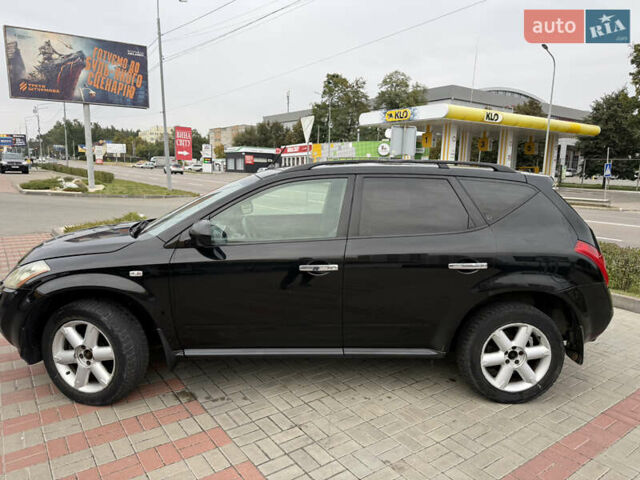 Черный Ниссан Мурано, объемом двигателя 3.5 л и пробегом 317 тыс. км за 4200 $, фото 3 на Automoto.ua